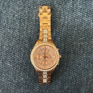 Jennifer Lopez gold watch